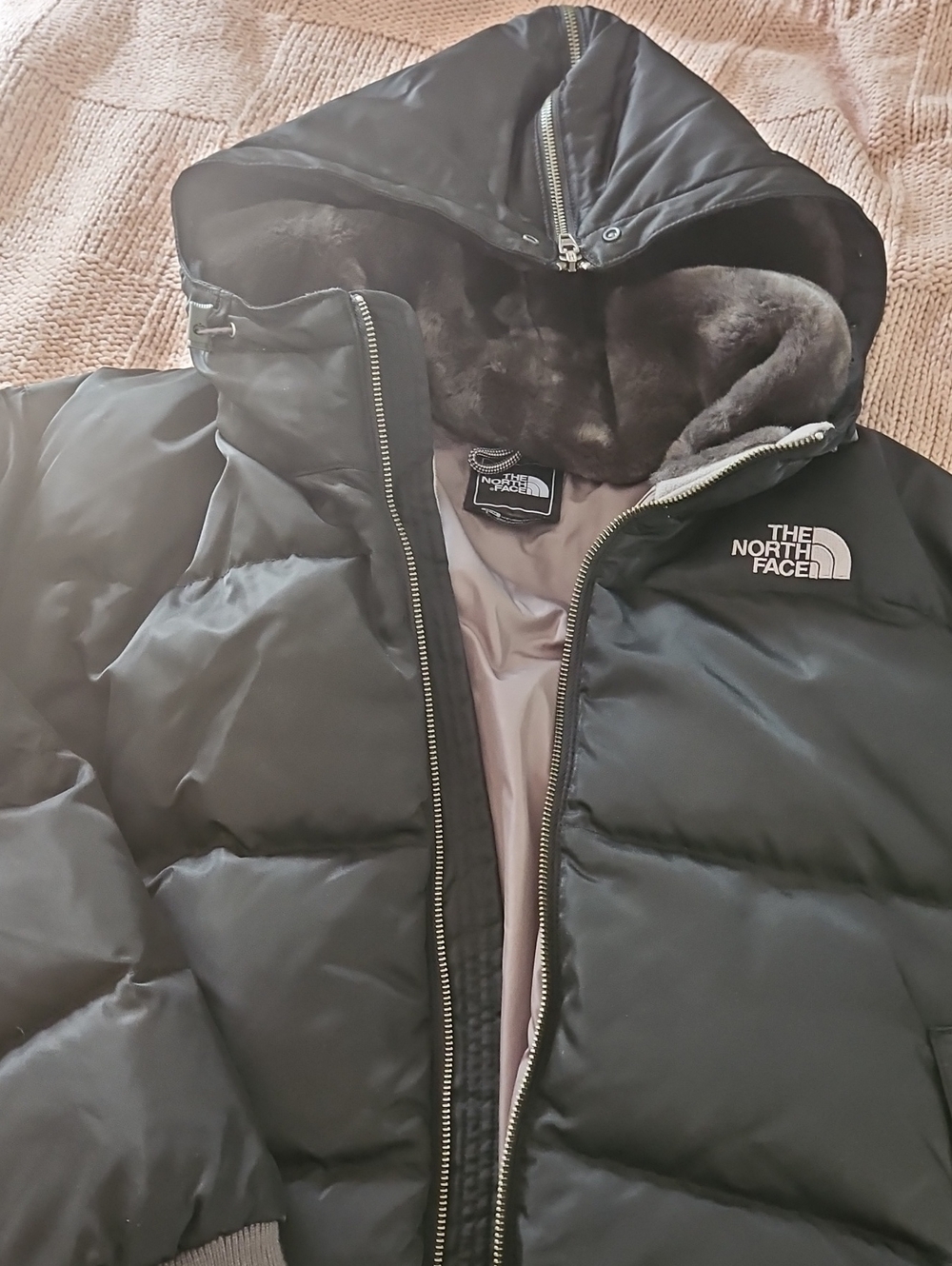The North Face Black Hooded Puffer Coat with Faux-Fur Lining..length 23"
